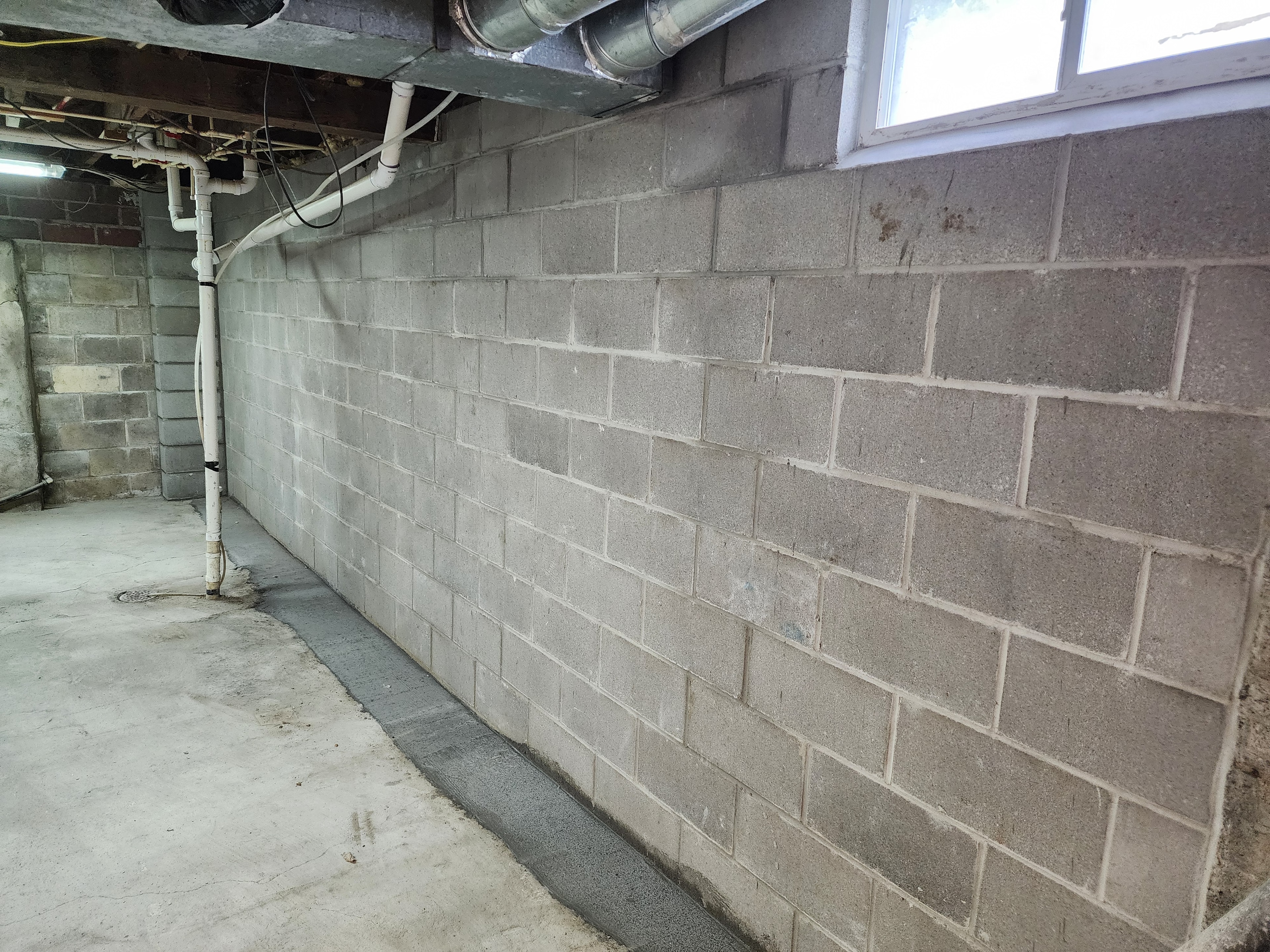 Bowed Foundation Wall Replacement — after